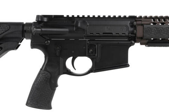 The Daniel Defense M4A1 rifle features a rubber overmolded pistol grip and black receivers
